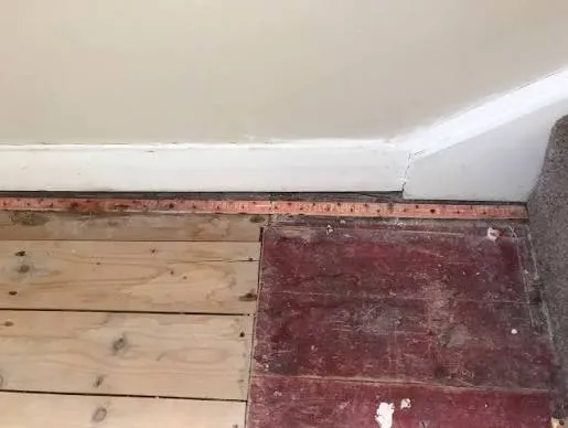 Warm Spot on floor and musty smell in hallway.